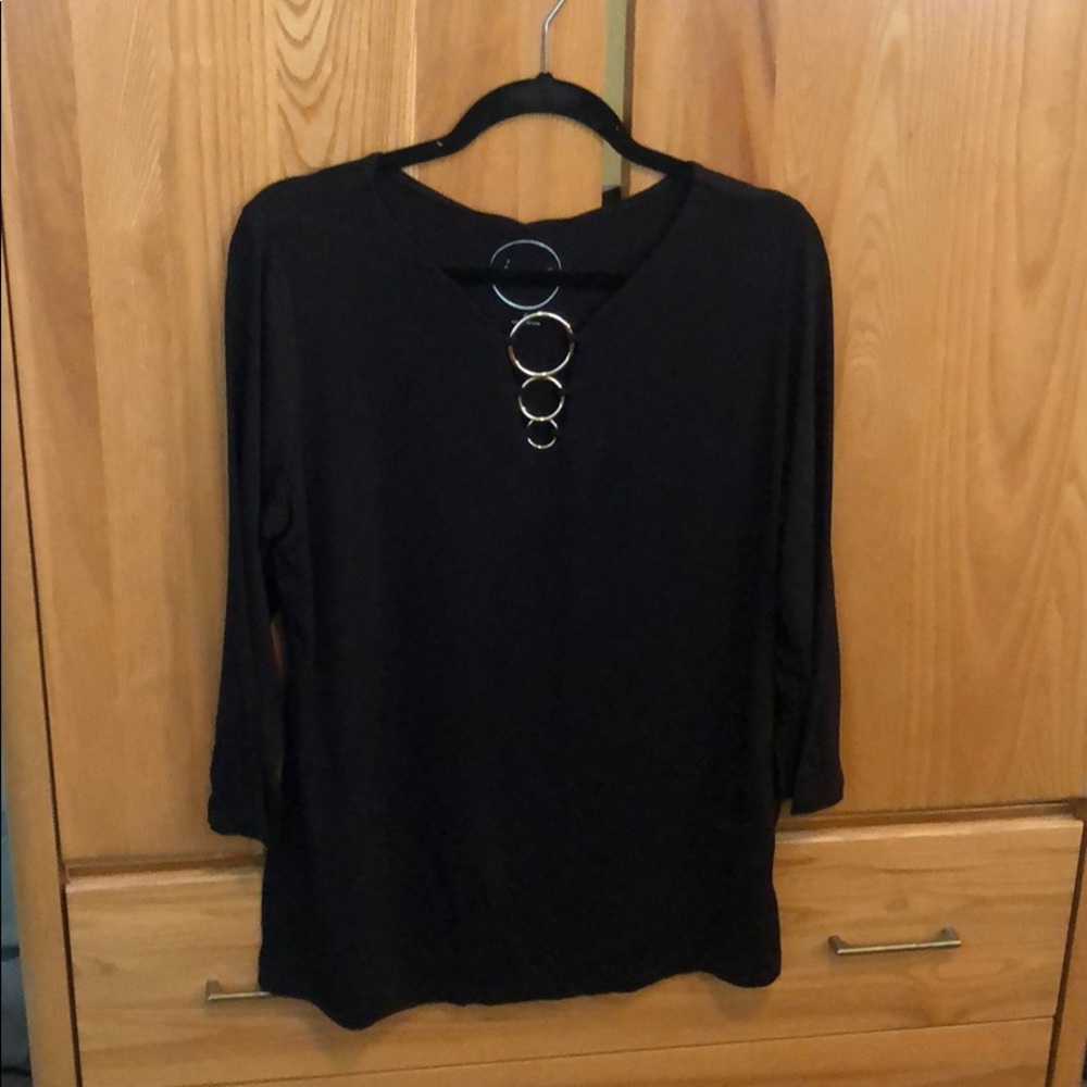 Deep black pullover blouse with detailed neckline